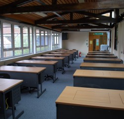 large classroom with screen desks installed