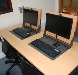 Versatile Flip screen installed into desks